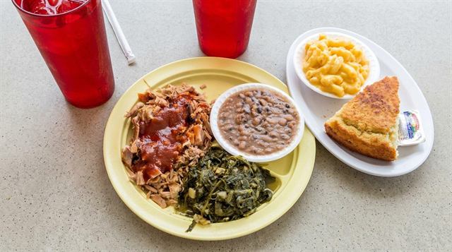 BBQ pork plate with greens, pinto beans, and mac and cheese at Betty's Bar-B-Q in Anniston, AL