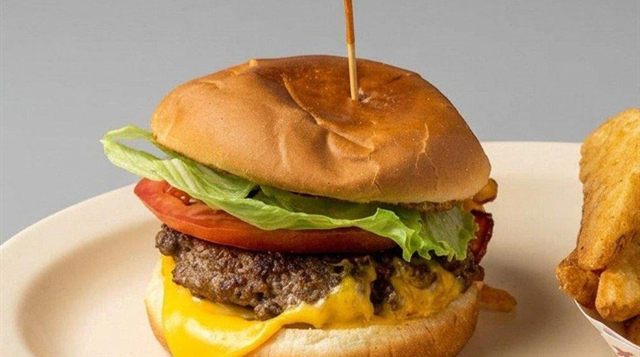 Cheeseburger with lettuce, tomato and melted cheese at Betty's Bar-B-Q in Anniston, AL