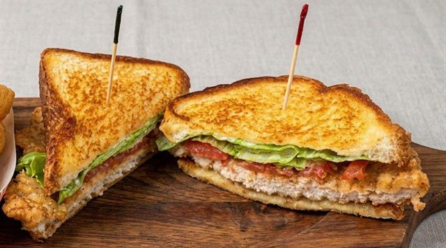 Country fried steak sandwich on toasted bread with lettuce and tomato at Betty's Bar-B-Q in Anniston, AL