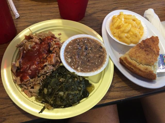 BBQ pork plate with turnip greens, pinto beans, mac and cheese and cornbread