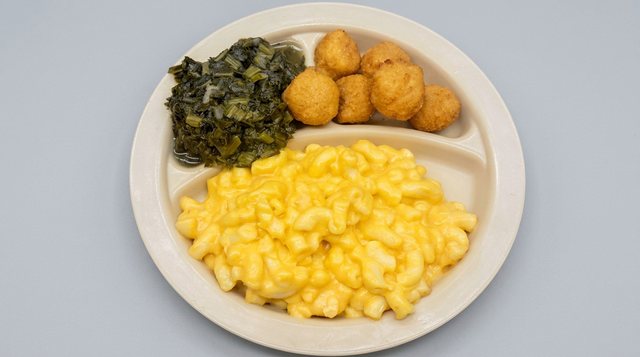 Mac and cheese plate with turnip greens and hushpuppies at Betty's Bar-B-Q in Anniston, AL